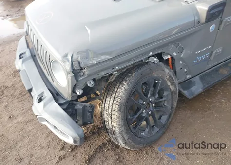 2021 Jeep Wrangler 4Xe Unlimited Sahara 4X4 z USA, uszkodzony, nr VIN 1C4JJXP67MW688912